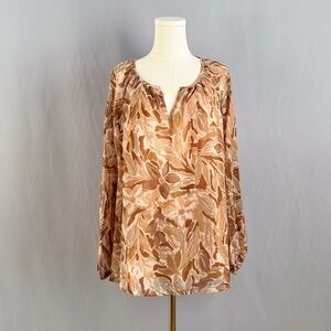 Neutral botanical v-neck print in warm tan, caramel, and soft beige tones.